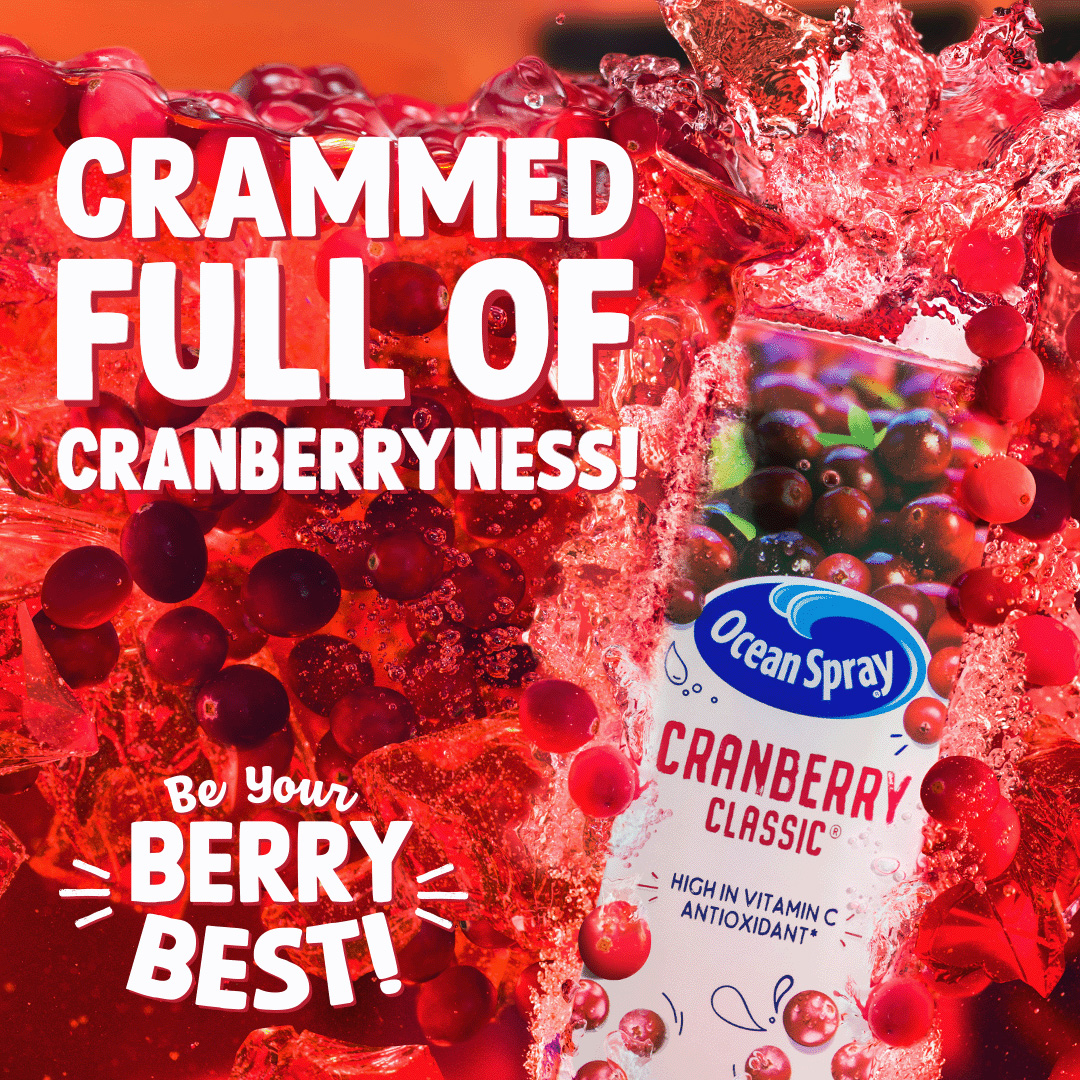 Ocean Spray's Cranberry Classic being dropped into a pool of red juice, ice and cranberries